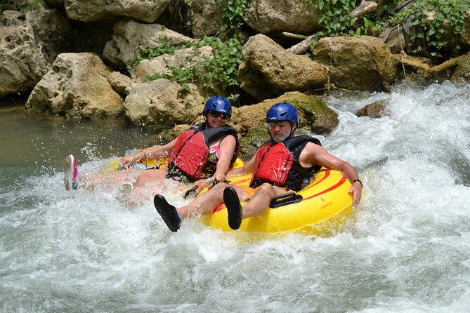River Rapids Waterfalls Tubing and Beach Adventure with Transport - Under the old stone bridge and toward the coast