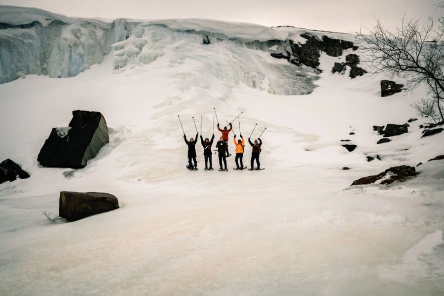 Snowshoeing Adventure to the Enchanting Frozen Waterfall - Following the trail through Alta’s winter woods