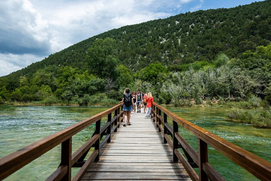 Split: Krka National Park Day Trip with Boat Ride & Swimming - The river boat to Skradin