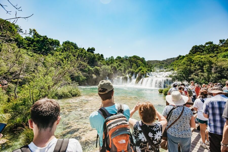Split: Krka Waterfalls Trip with Boat Cruise and Swimming - Walking the Skradinski Buk circuit