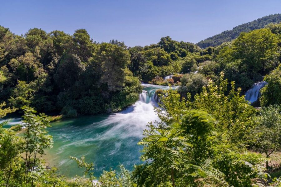 Split: Krka Waterfalls With Boat Cruise, Wine and Olive Oil - Old mills, stone houses, and early electricity