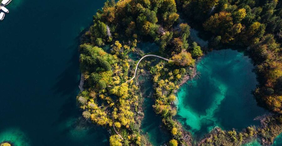 Split: Self-Guided Plitvice Lakes Day Tour with Boat Ride - Wooden walkways beside the lower lakes