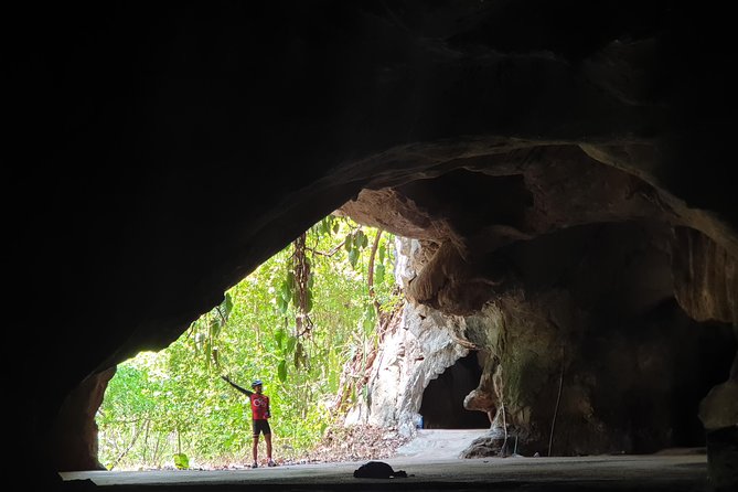 Sticky Waterfall Cycling Tour - The longtail boat makes a memorable start