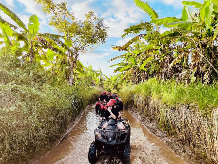Ubud: Gorilla Face Quad Bike, Jungle Swing, Waterfall & Meal - Goa Raja Waterfall and the canyon light