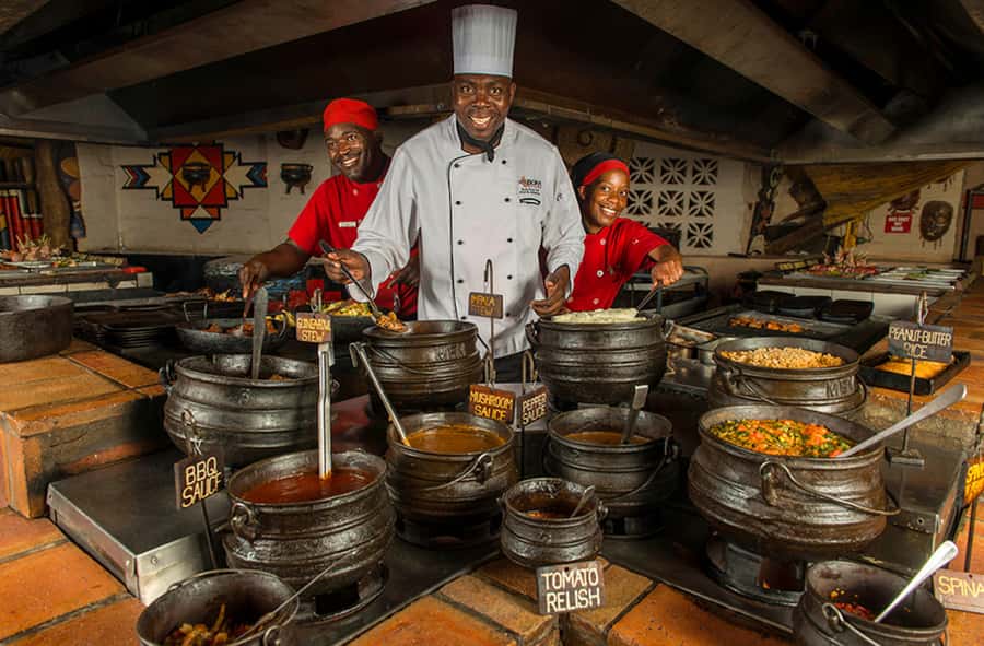 Victoria Falls: Boma Dinner and Drum Show - Arriving in chitenge for a lively welcome