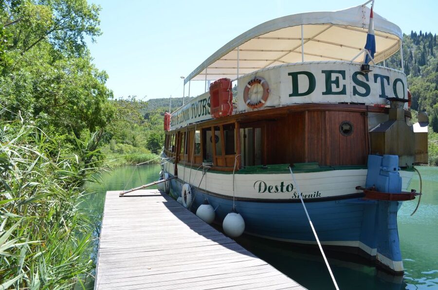 Vodice: Krka Waterfalls National Park Boat Tour - Mussels, bread, and a welcome local stop