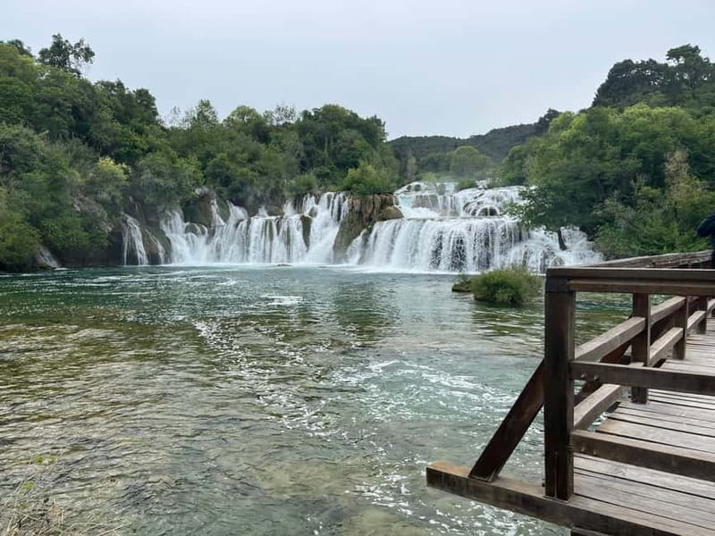 Zadar: Krka Waterfalls Tour, Boat Cruise & Swimming - Walking around Skradinski buk
