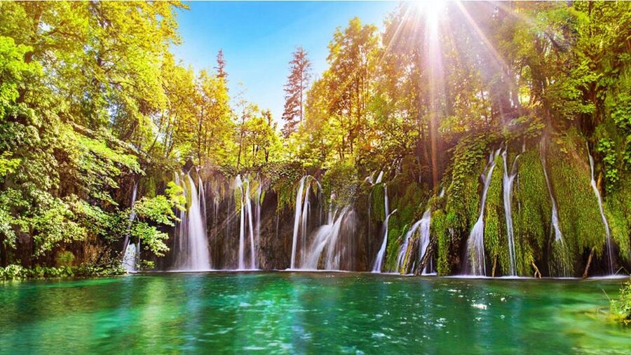 Zadar: Plitvice Lakes Guided Day Tour with Tickets - The boat and electric train rides